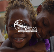Slum2School campaign featuring a smiling child